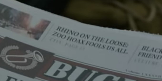 The same picture of the Daily Bugle newspaper again but zoomed in on the top middle, where the words 'Rhino On The Loose: Zoo hoax fools us all' are visible