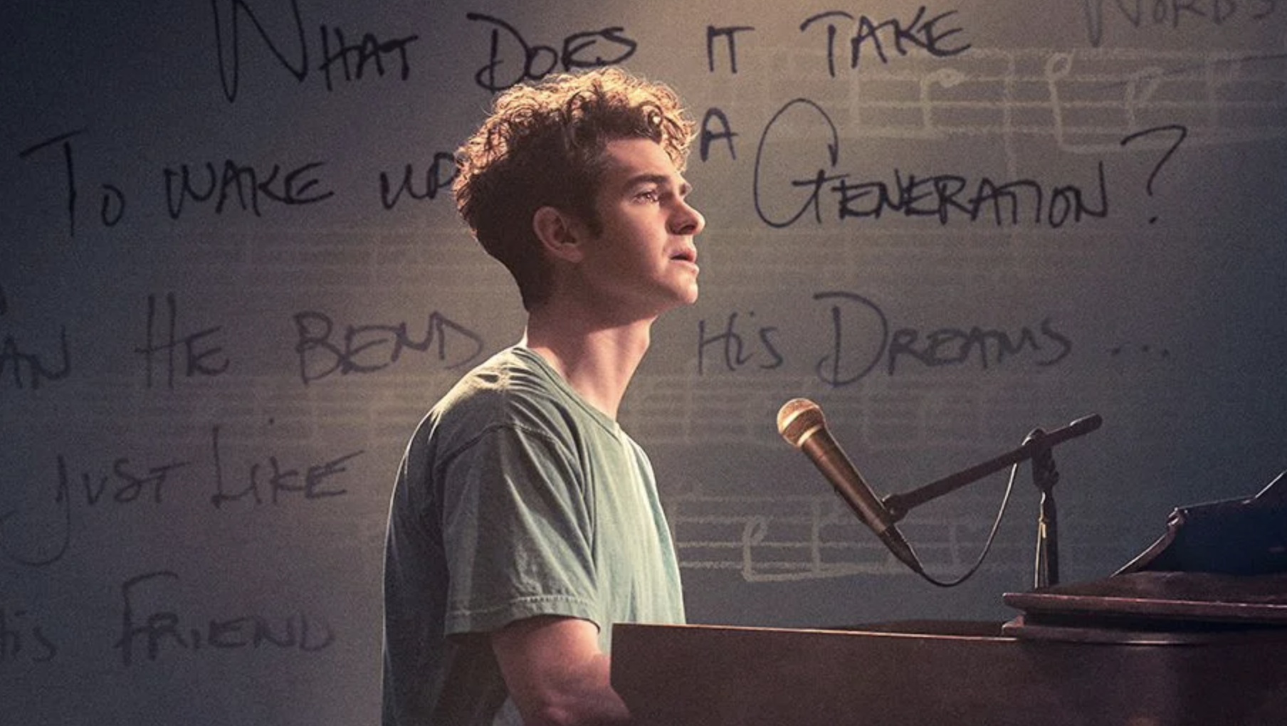 andrew sits at a piano in the movie &quot;tick tick boom&quot;
