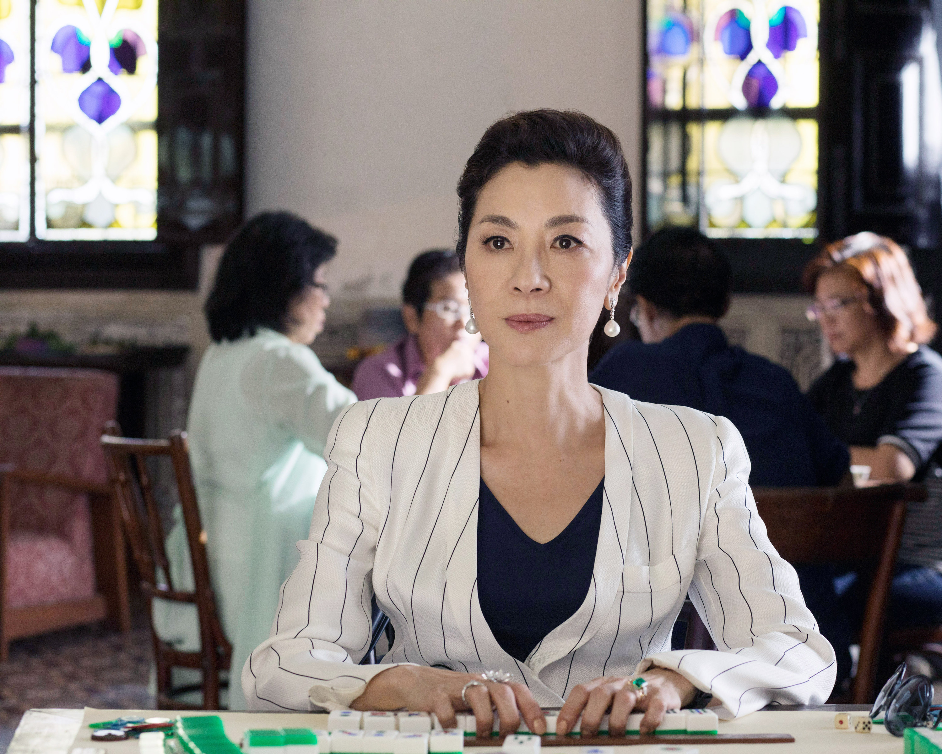 Michelle Yeoh playing mahjong in Crazy Rich Asians