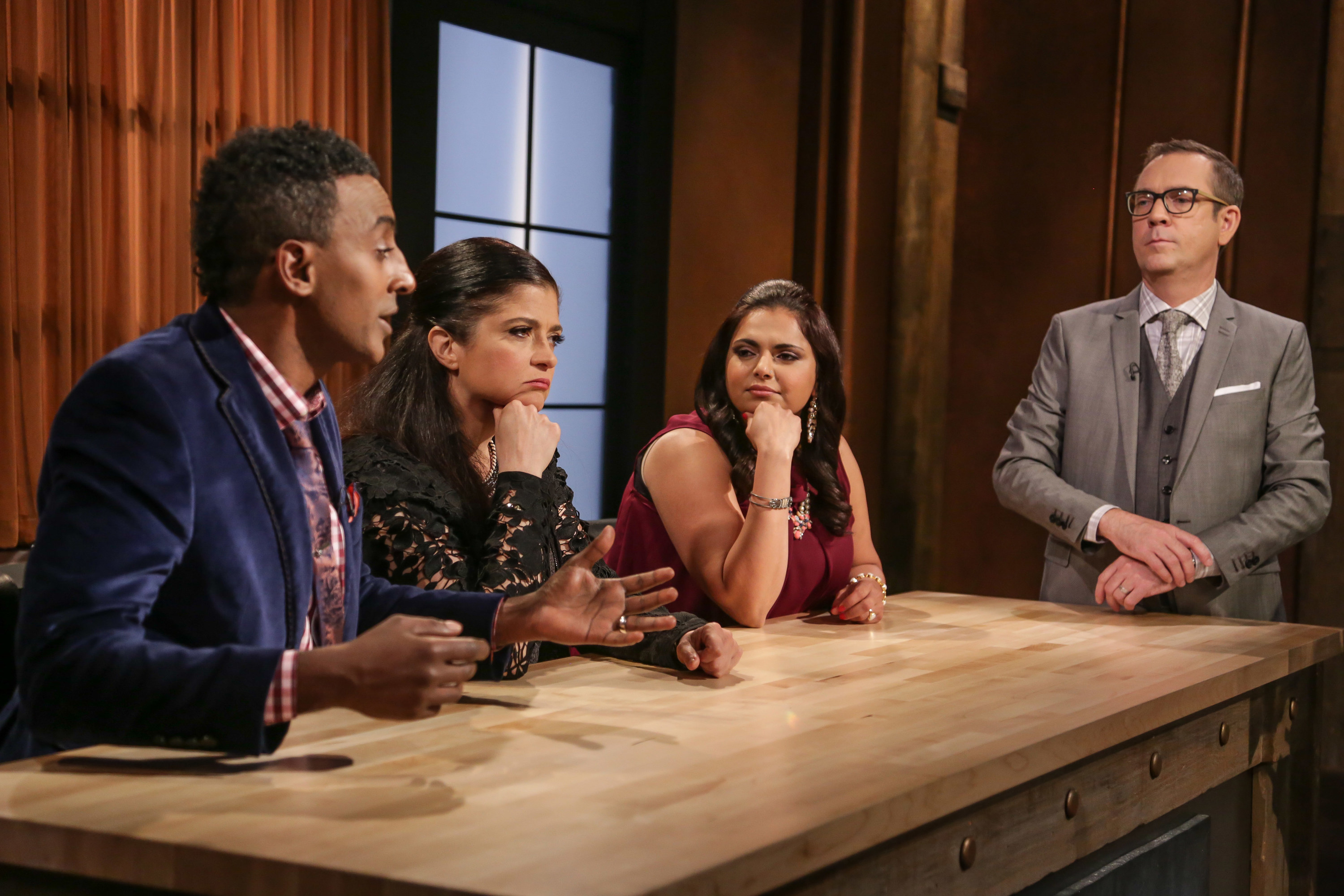 Ted Allen and a panel of judges on &quot;Chopped.&quot;