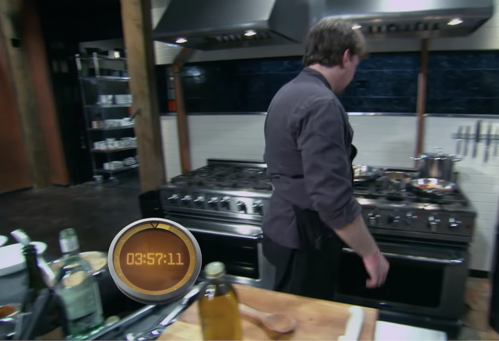 A chef cooking on &quot;Chopped.&quot;