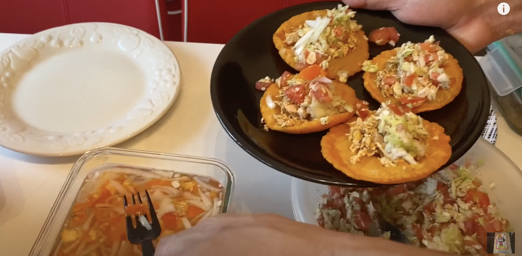 A person holds salbutes on a plate
