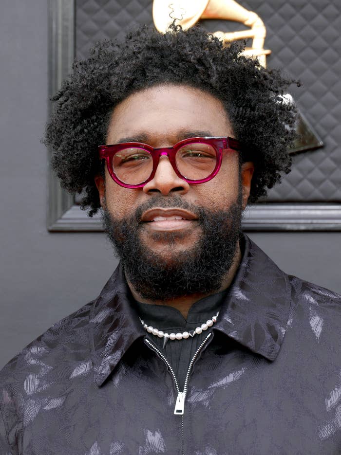 Questlove smiles in the camera