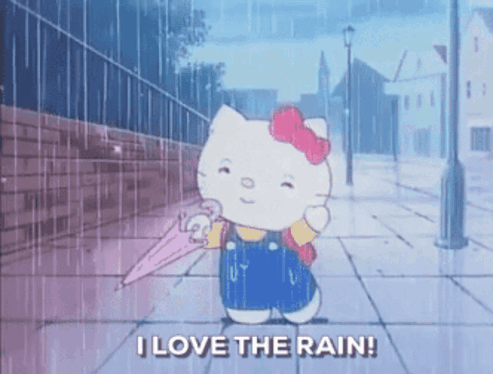 hello kitty dancing in the rain saying &quot;I love the rain!&quot;