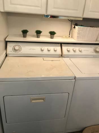 reviewers washer before, looking yellowed, dented, and scratched