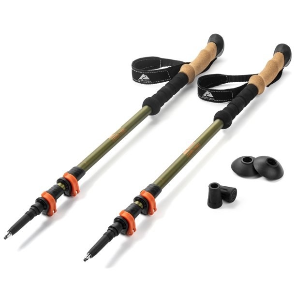 adjustable green trekking poles with cork handles, wrist straps,  and caps for the ends