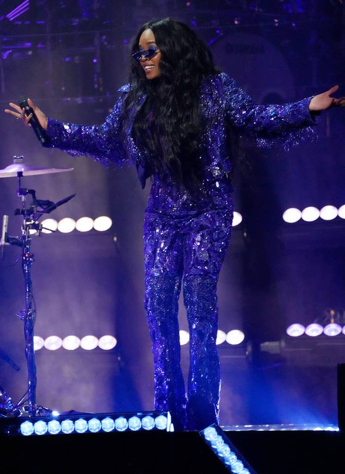 H.E.R performing onstage