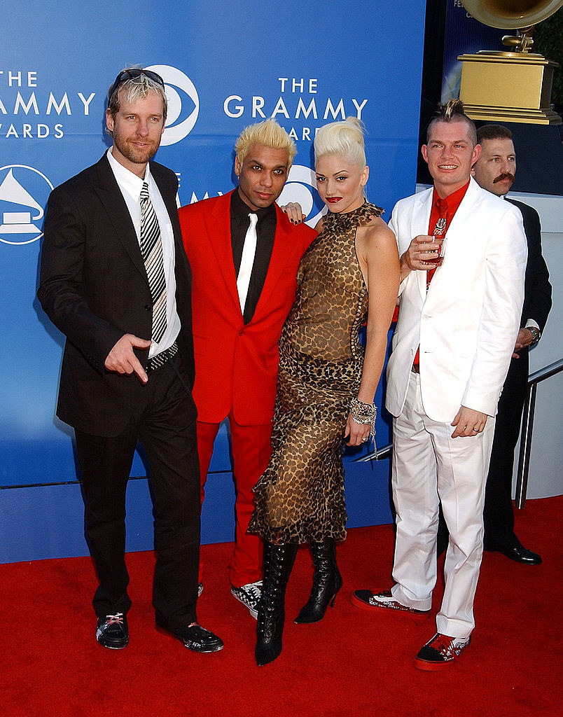 The guys wearing suits with ties and Gwen Stefani wearing a leopard-print halter dress
