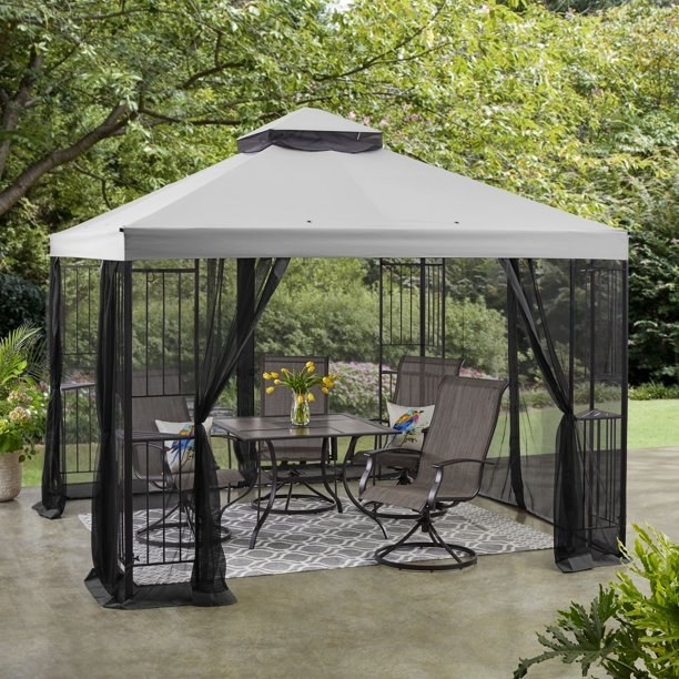 Gazebo providing shade for table and chairs