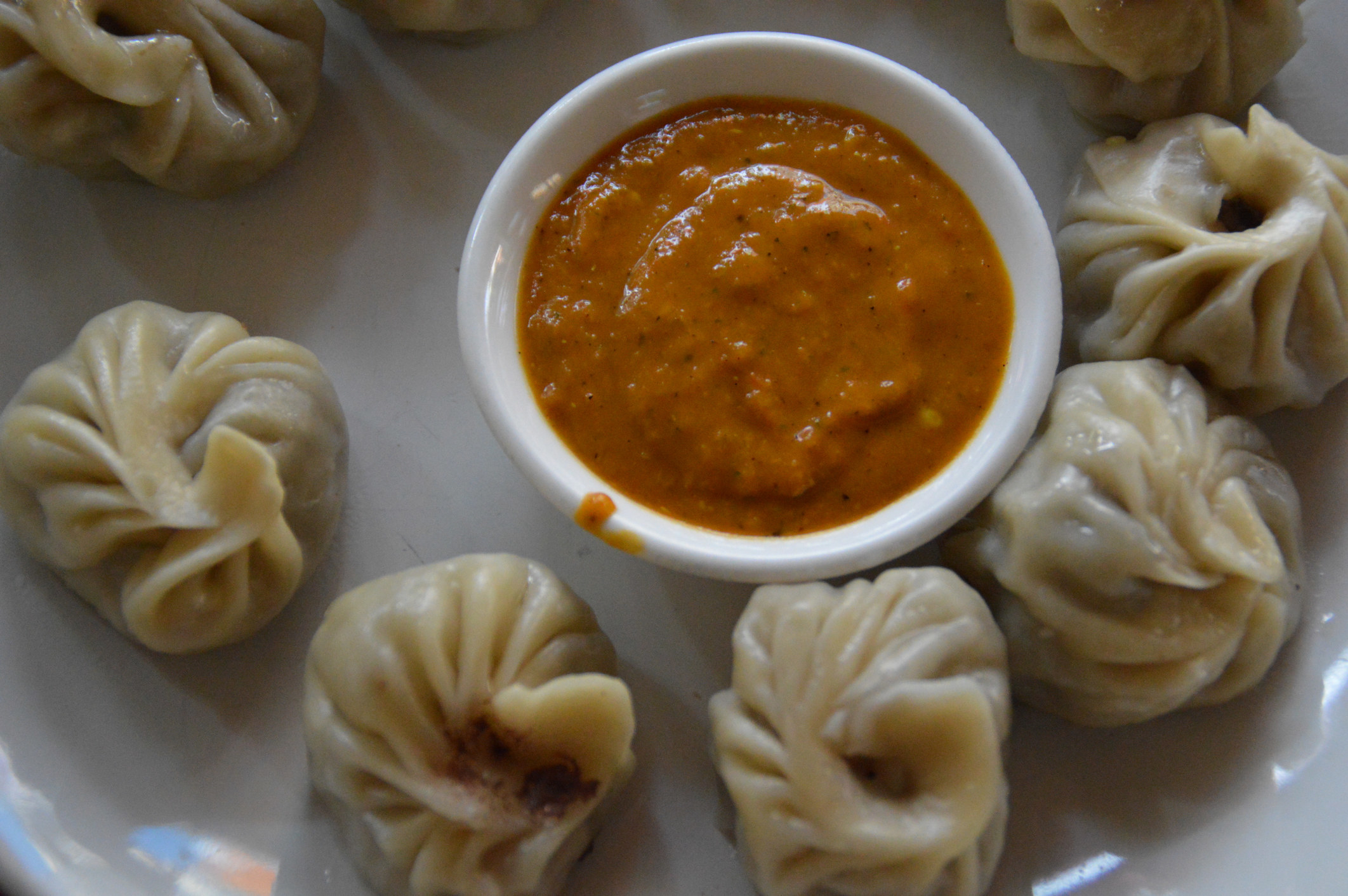 Nepali steamed dumplings with dipping sauce