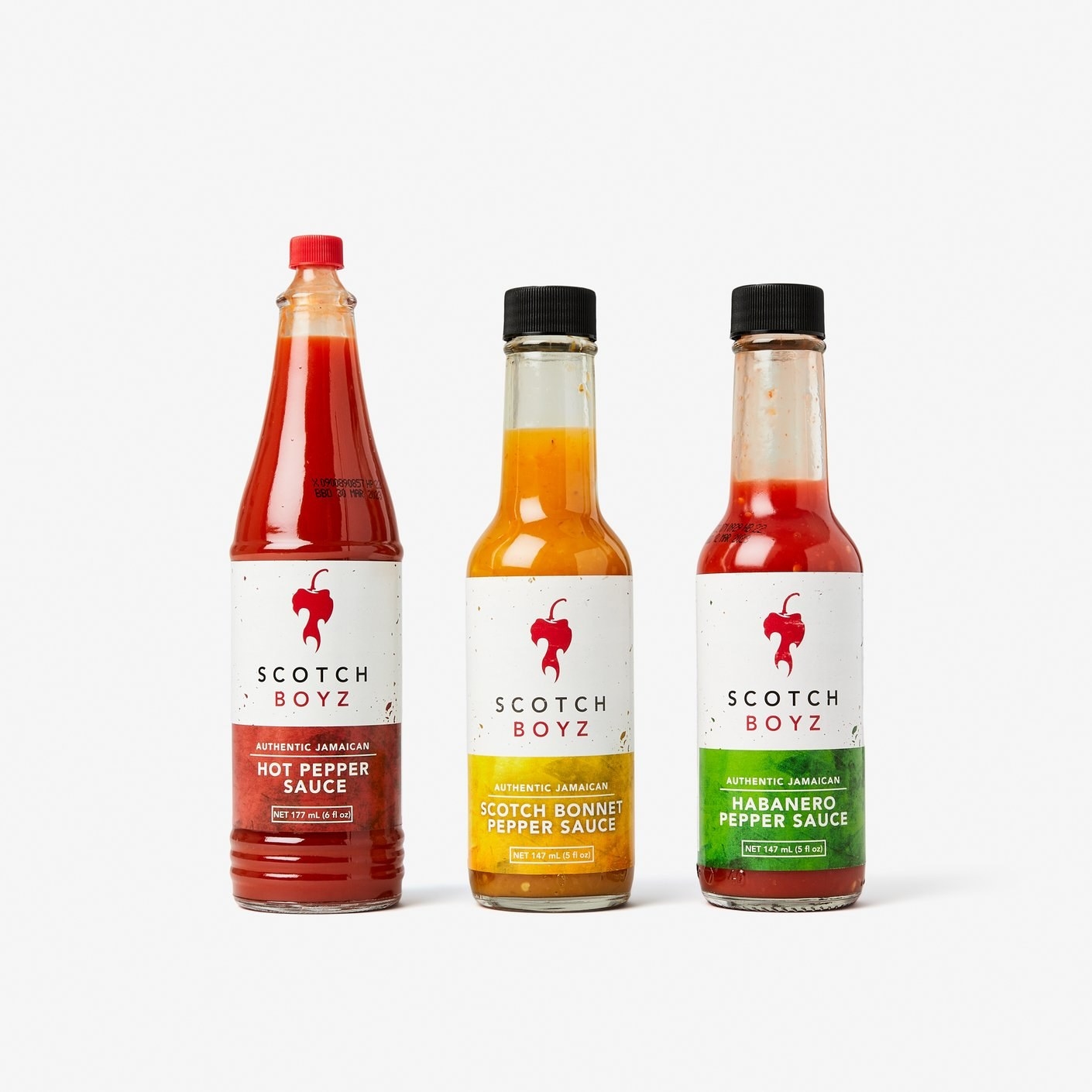 the three bottles of hot sauce