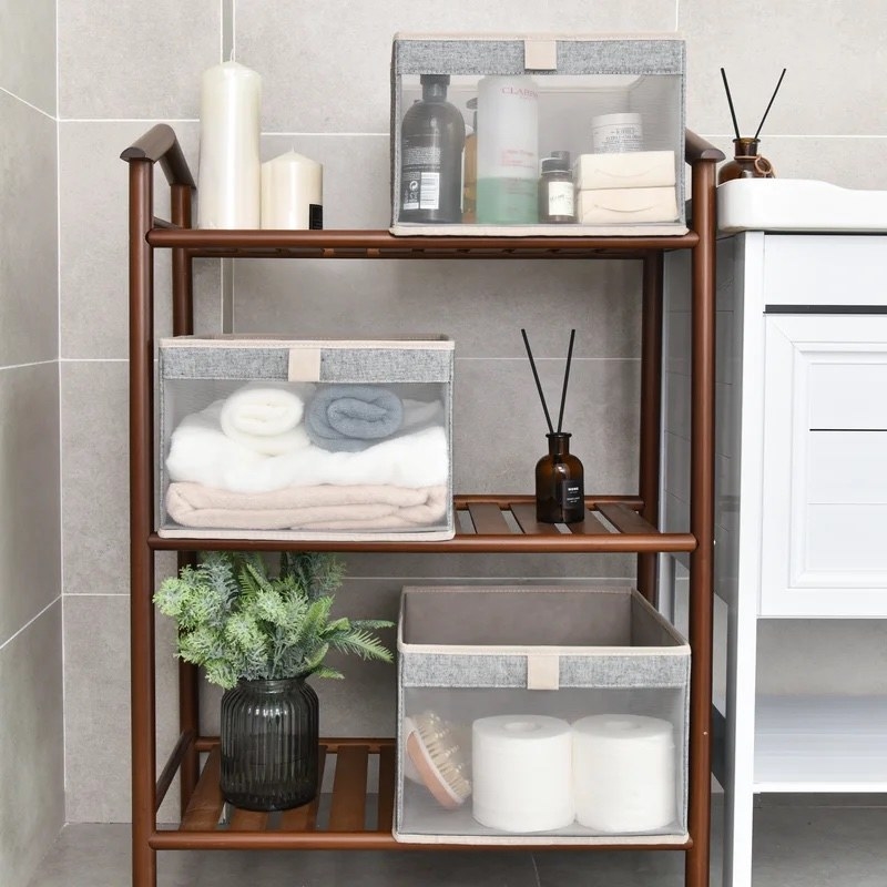 the three cubes in a bathroom shelving unit