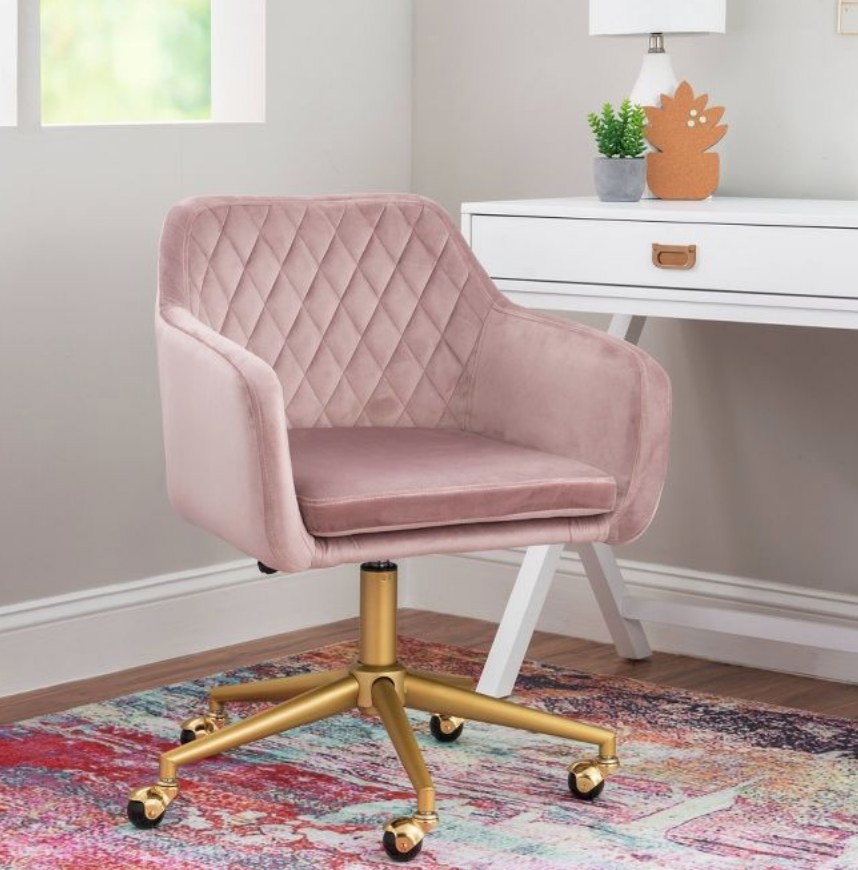 A pink quilted swivel office chair
