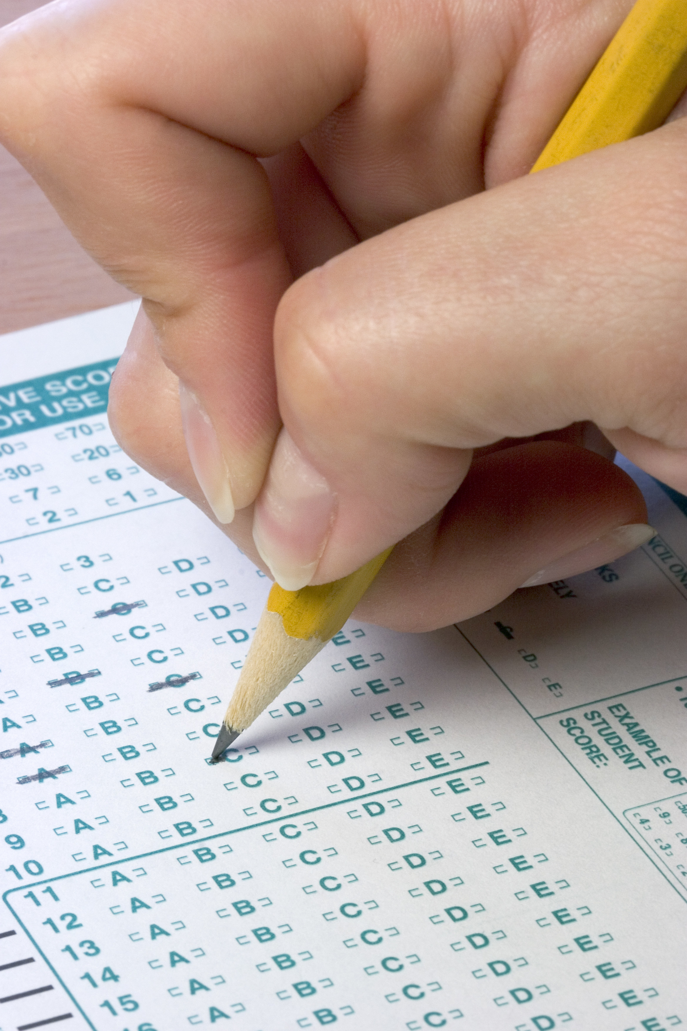 A student filling in a Scantron.