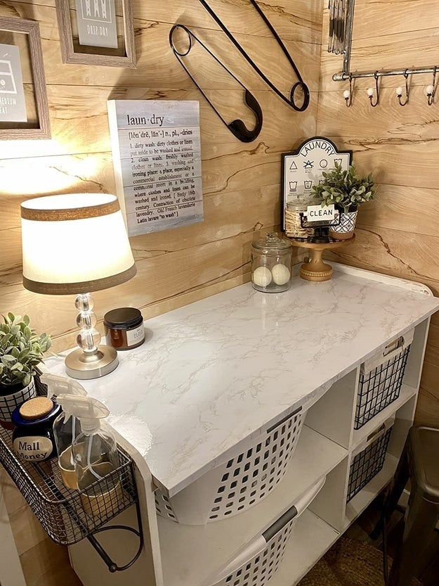 a table  covered successful  the granite adhesive paper