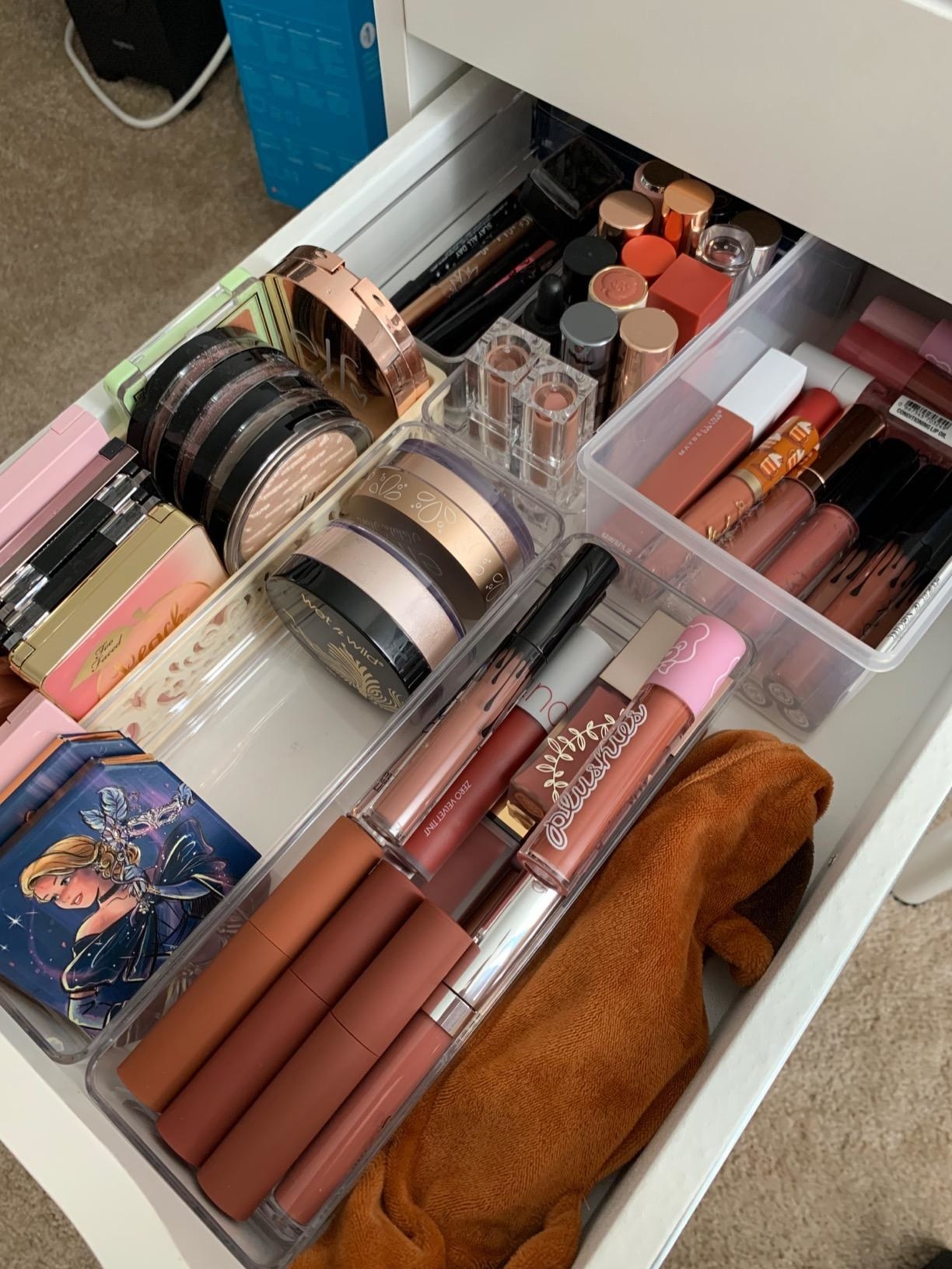 makeup organized into clear bins