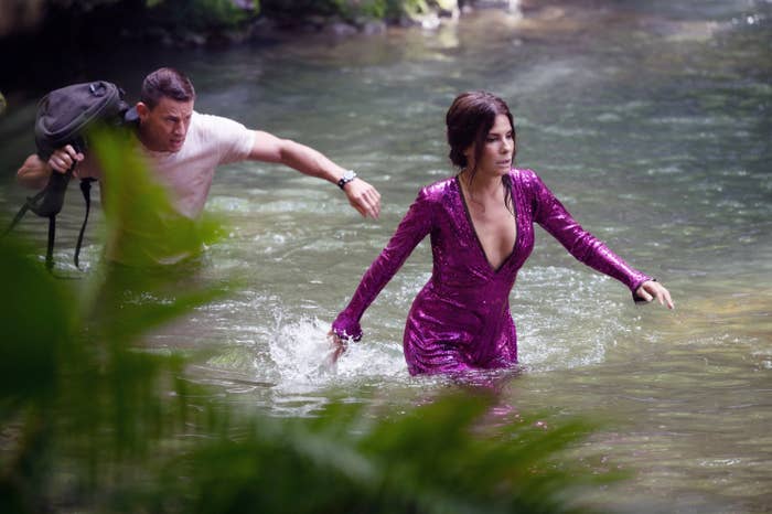 Sandra Bullock and Channing Tatum cross a river by walking through its water