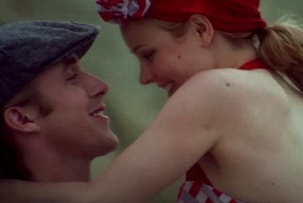 Ryan Gosling as Noah and Rachel McAdams as Allie smile as they visit the beach in &quot;The Notebook&quot;