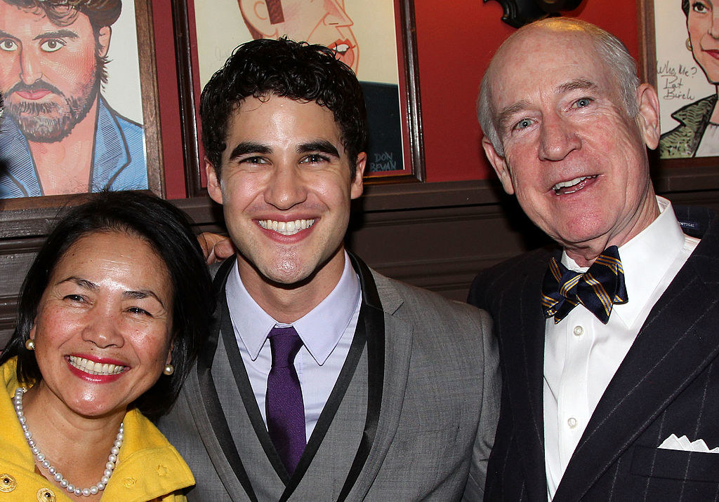 Darren poses with his family
