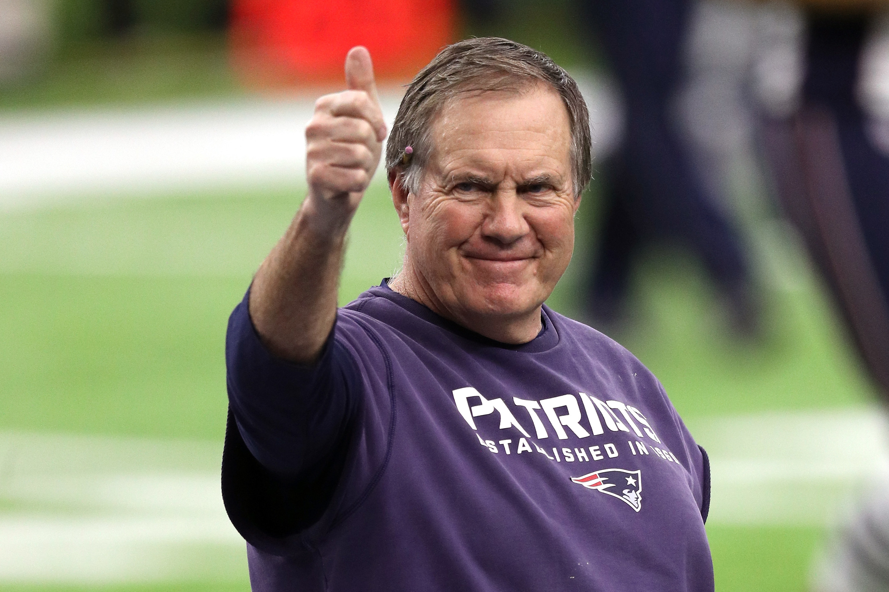 Bill Belichick gives a thumbs up