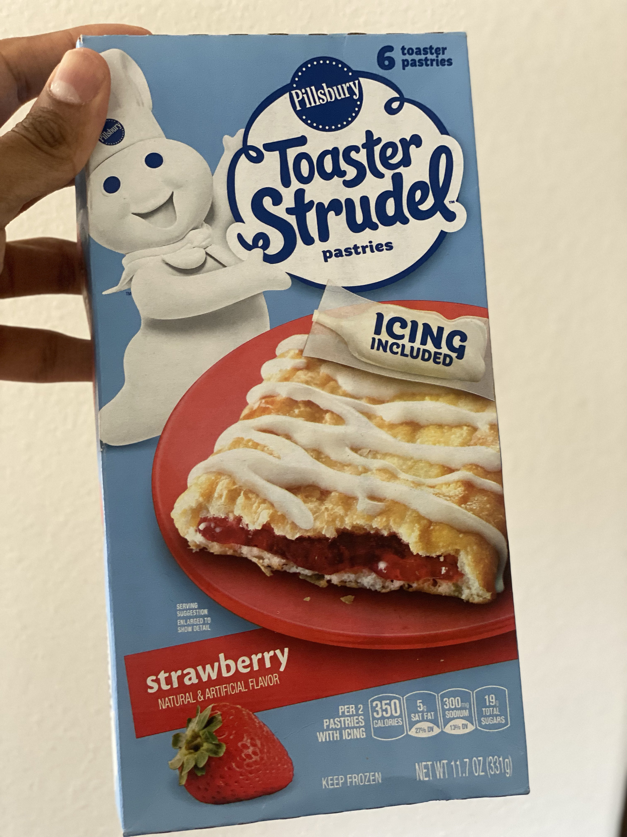 box showing a cartoon doughboy icing a strawberry toaster strudel
