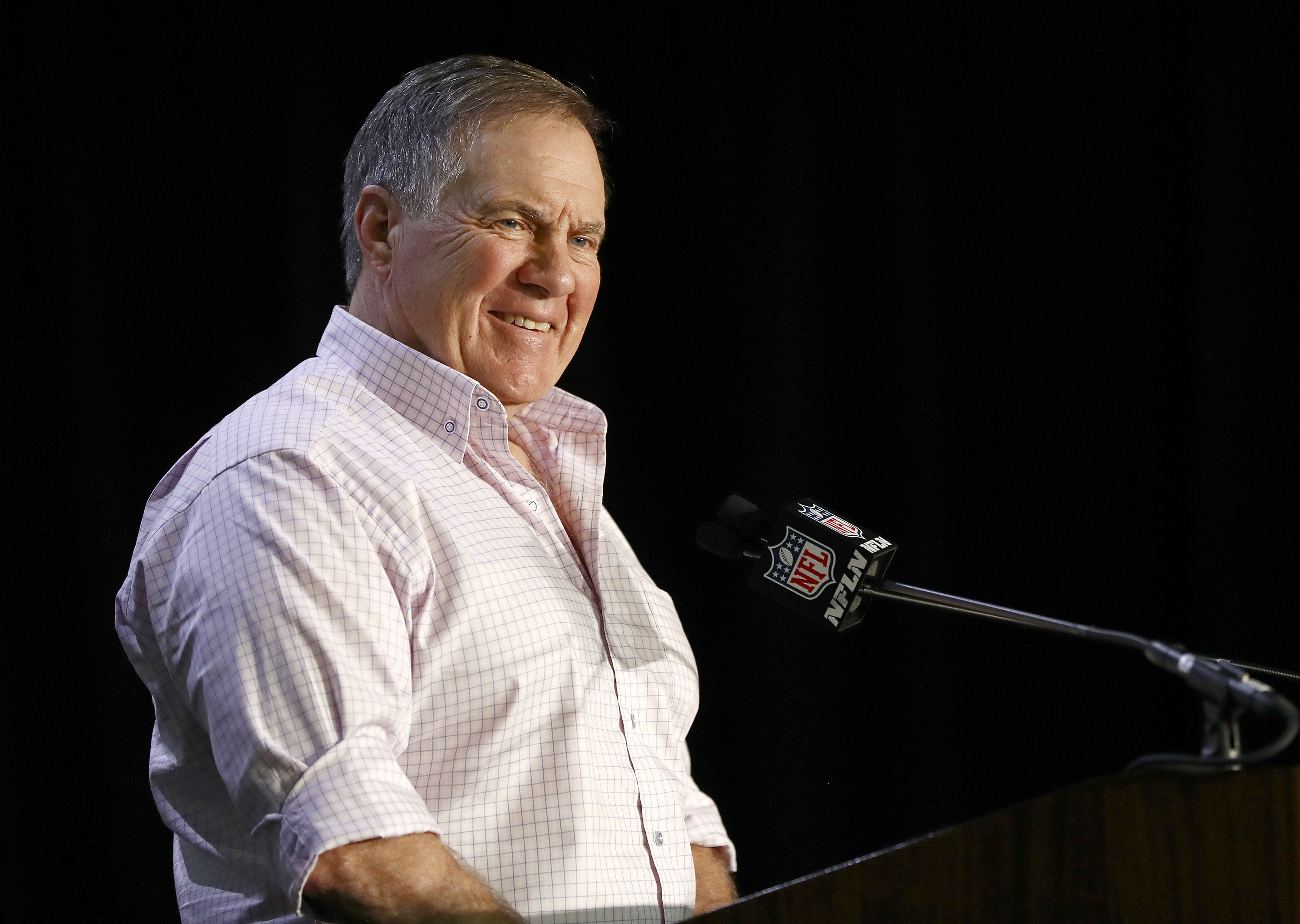 Bill Belichick in a pink button-up