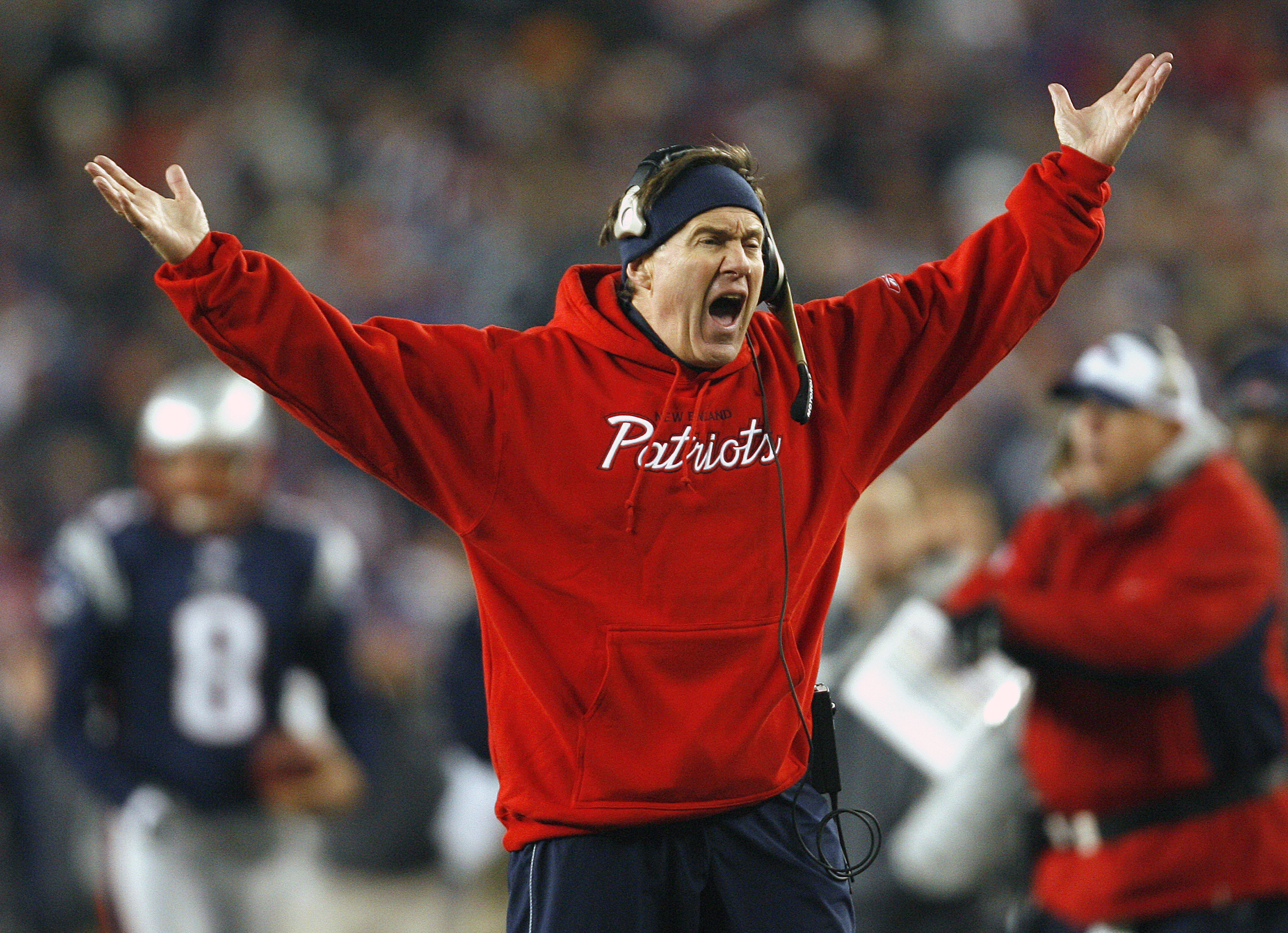 Bill Belichick in a red sweater