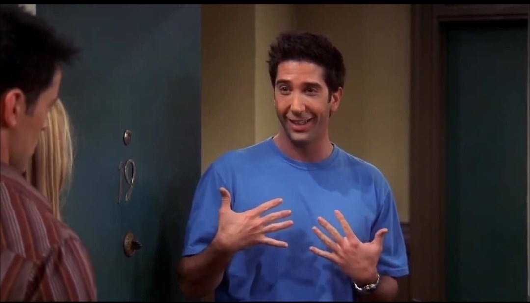 Ross Geller wears a brightly colored short sleeve shirt