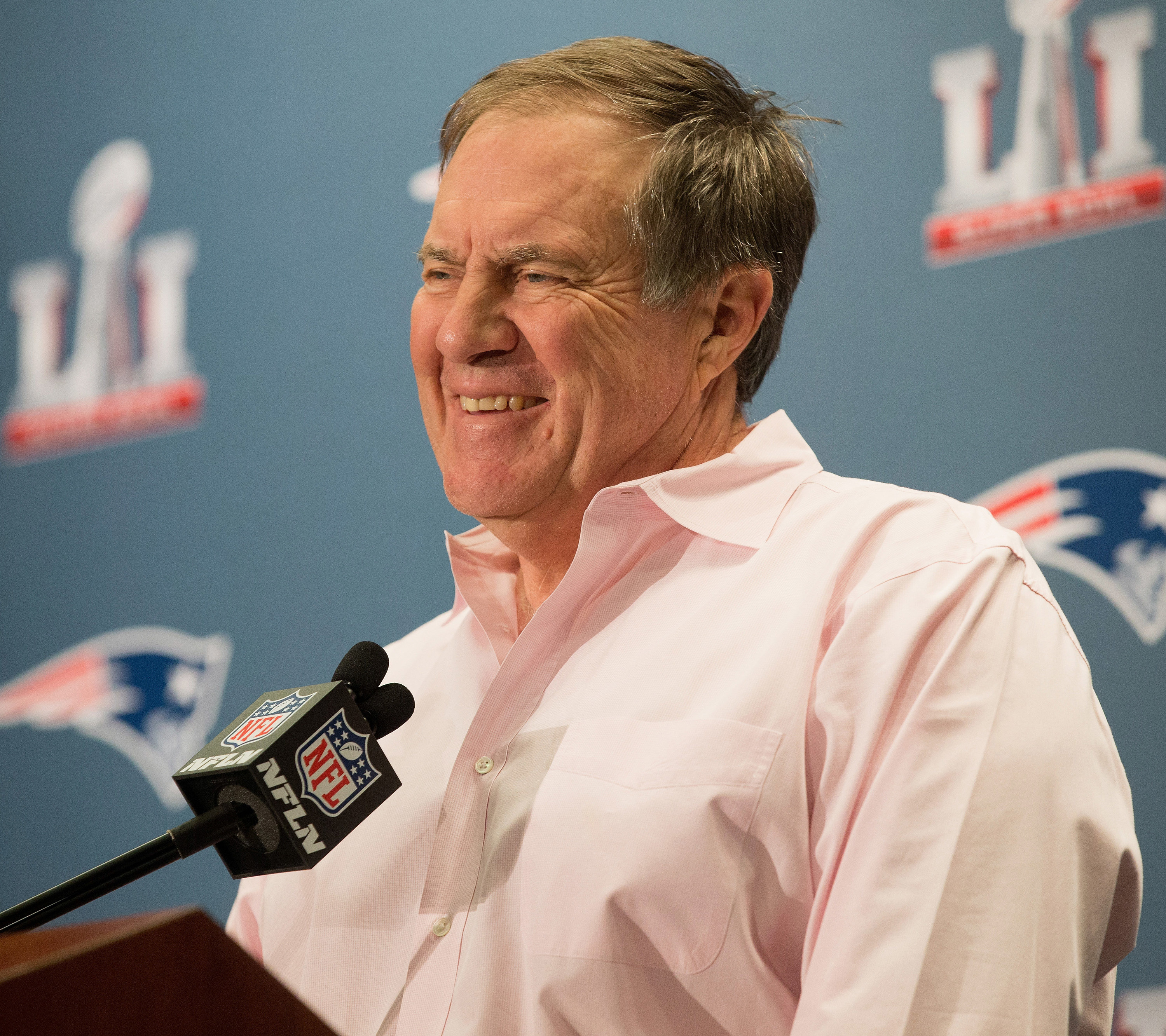 Bill Belichick in a pink dress shirt