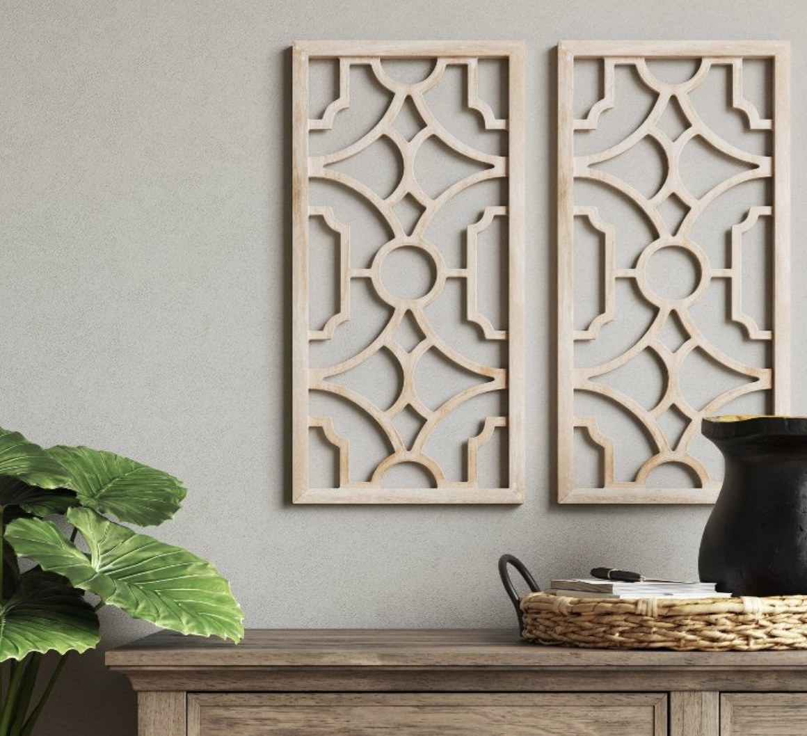 the two wooden lattices hanging on a wall