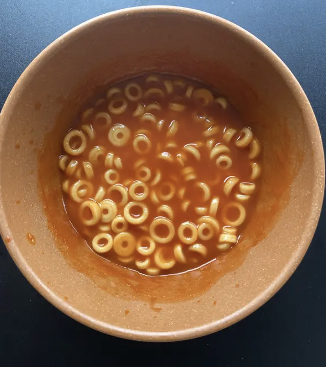 a soupy meal of O-shaped noodles