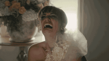 a bride crying with makeup running down her face