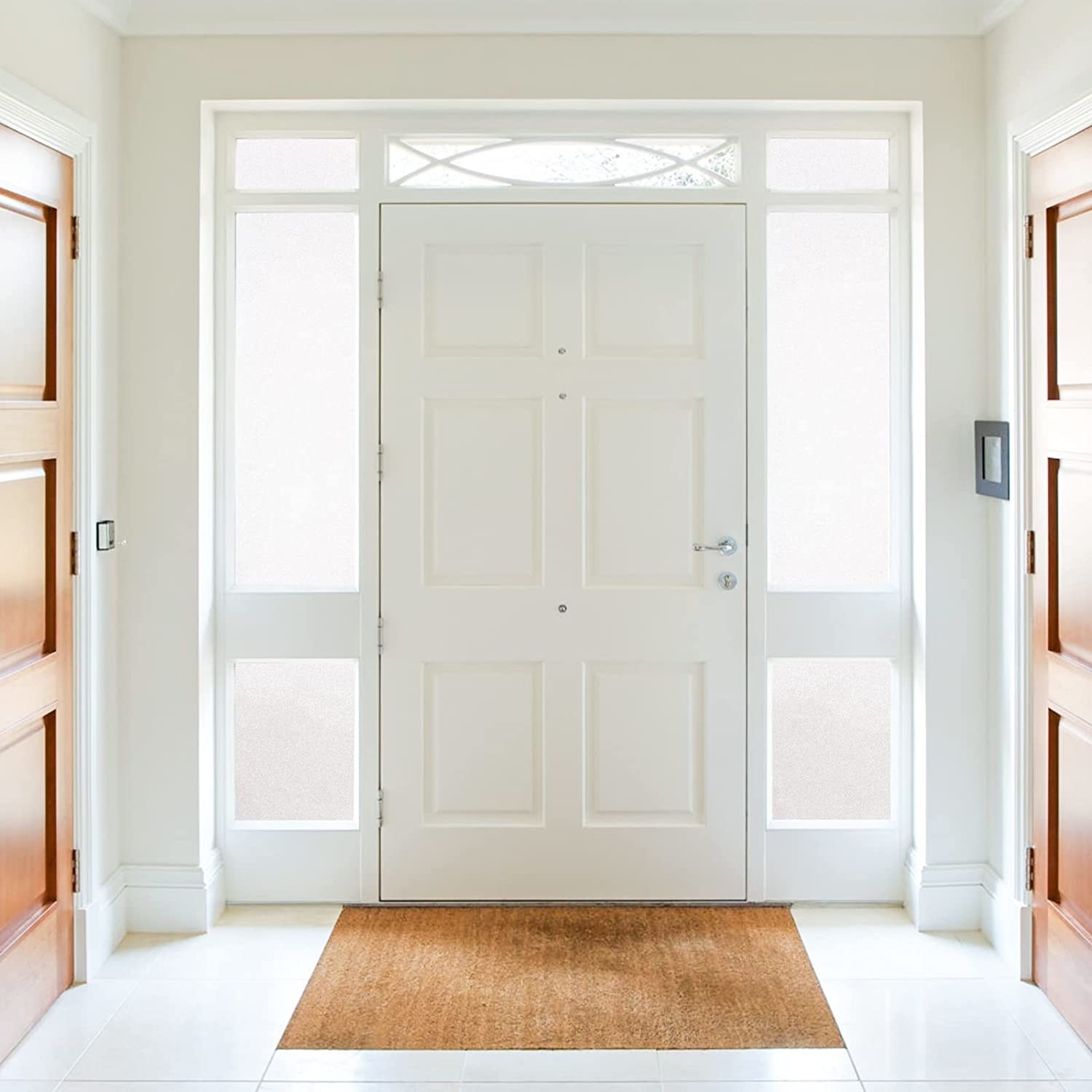 The privacy film on four windows around a large door