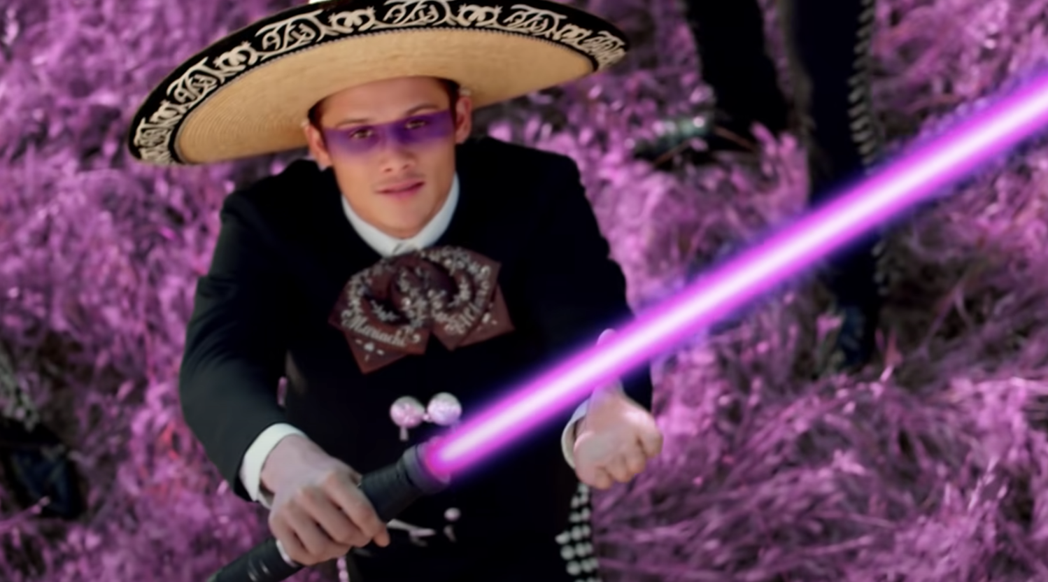 Timothy in the music video with a sombrero and lightsaber
