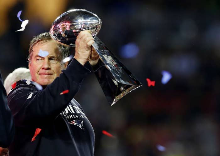 Bill Belichick holds Lombardi Trophy