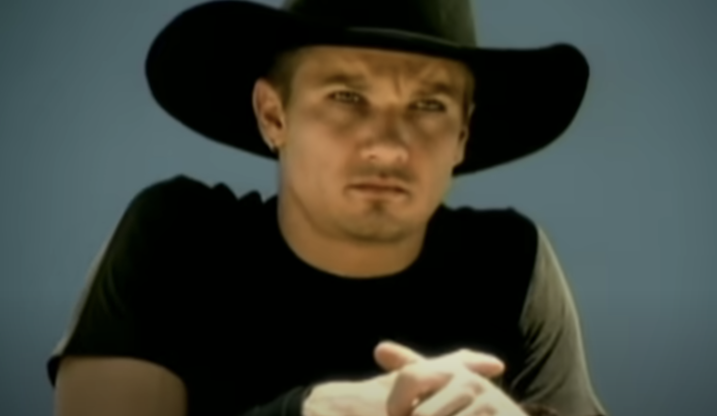 Jeremy in the video in a cowboy hat
