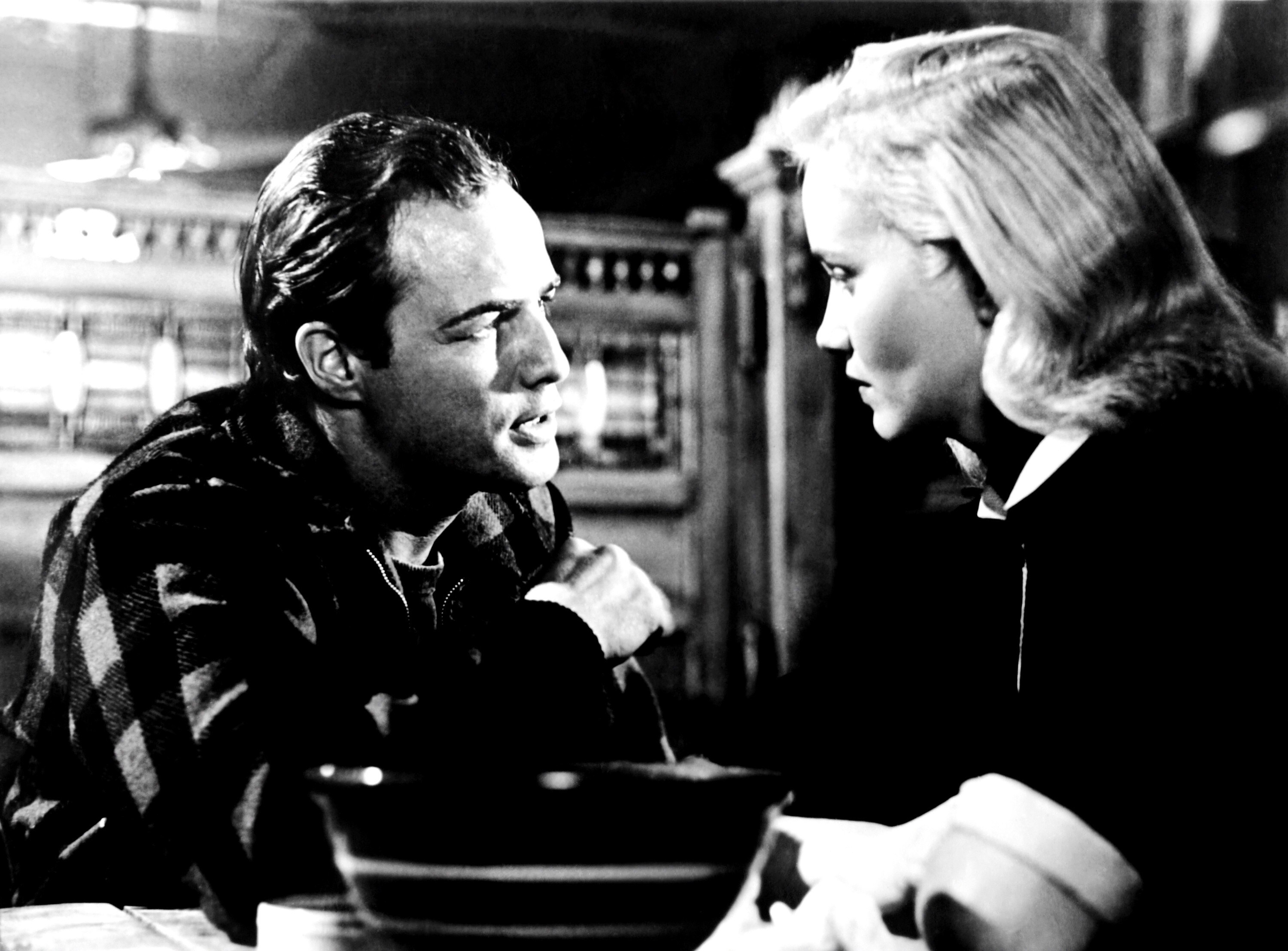 Marlon Brando and Eva Marie Saint looking at each other intensely