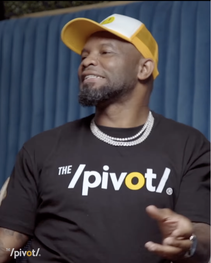 Fred wearing a T-shirt with the logo of &quot;The Pivot&quot;
