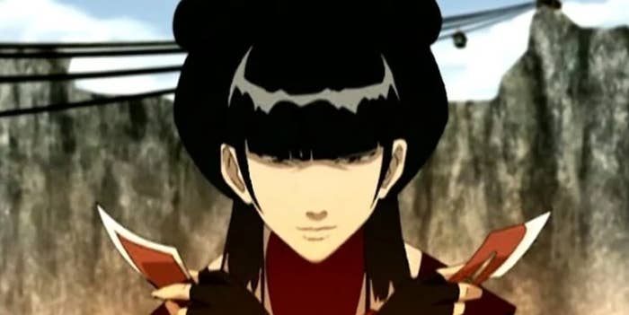 mai is a woman with thick bangs and a high ponytail. eyebrows are hidden by the brows and mouth in a line