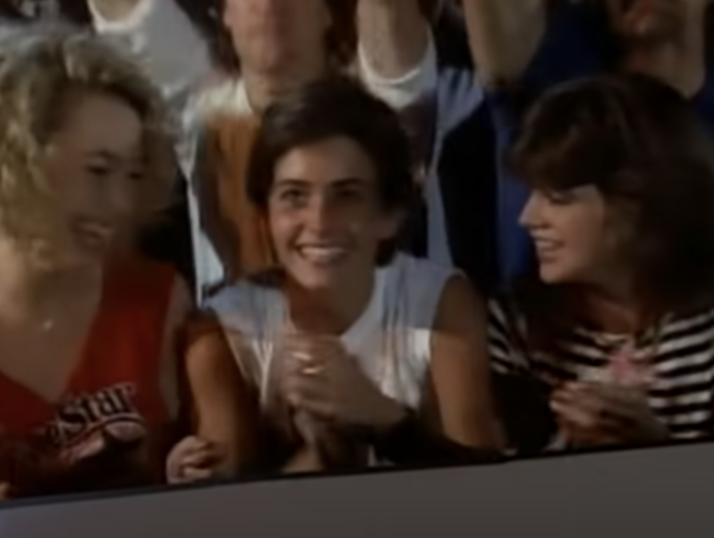 Cox in a concert crowd in the music video