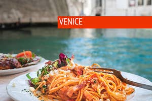 A plate of pasta is shown above a canal and labeled, "Venice"