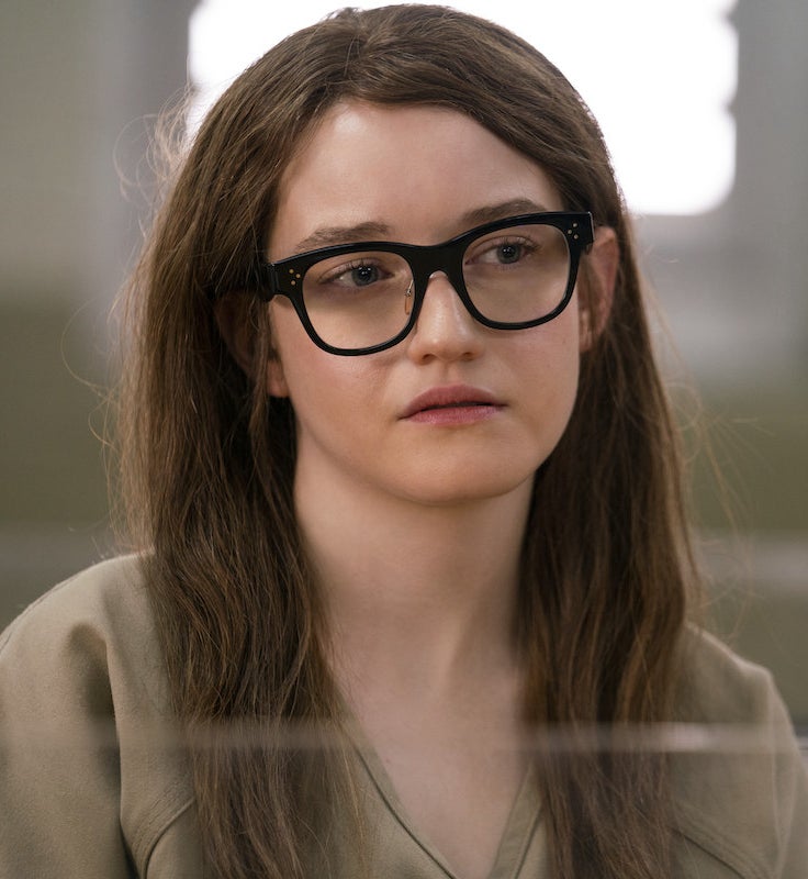 Julia as Anna in prison with the same glasses