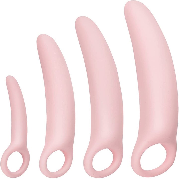 Four pink curved dilators