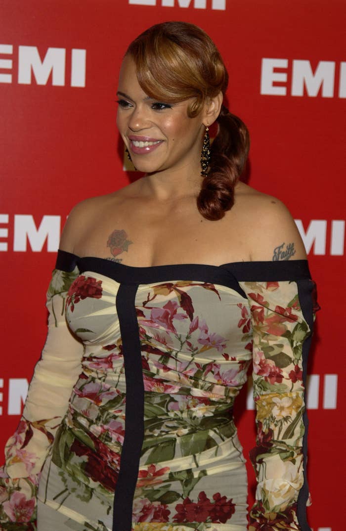 Faith Evans smiling at an event