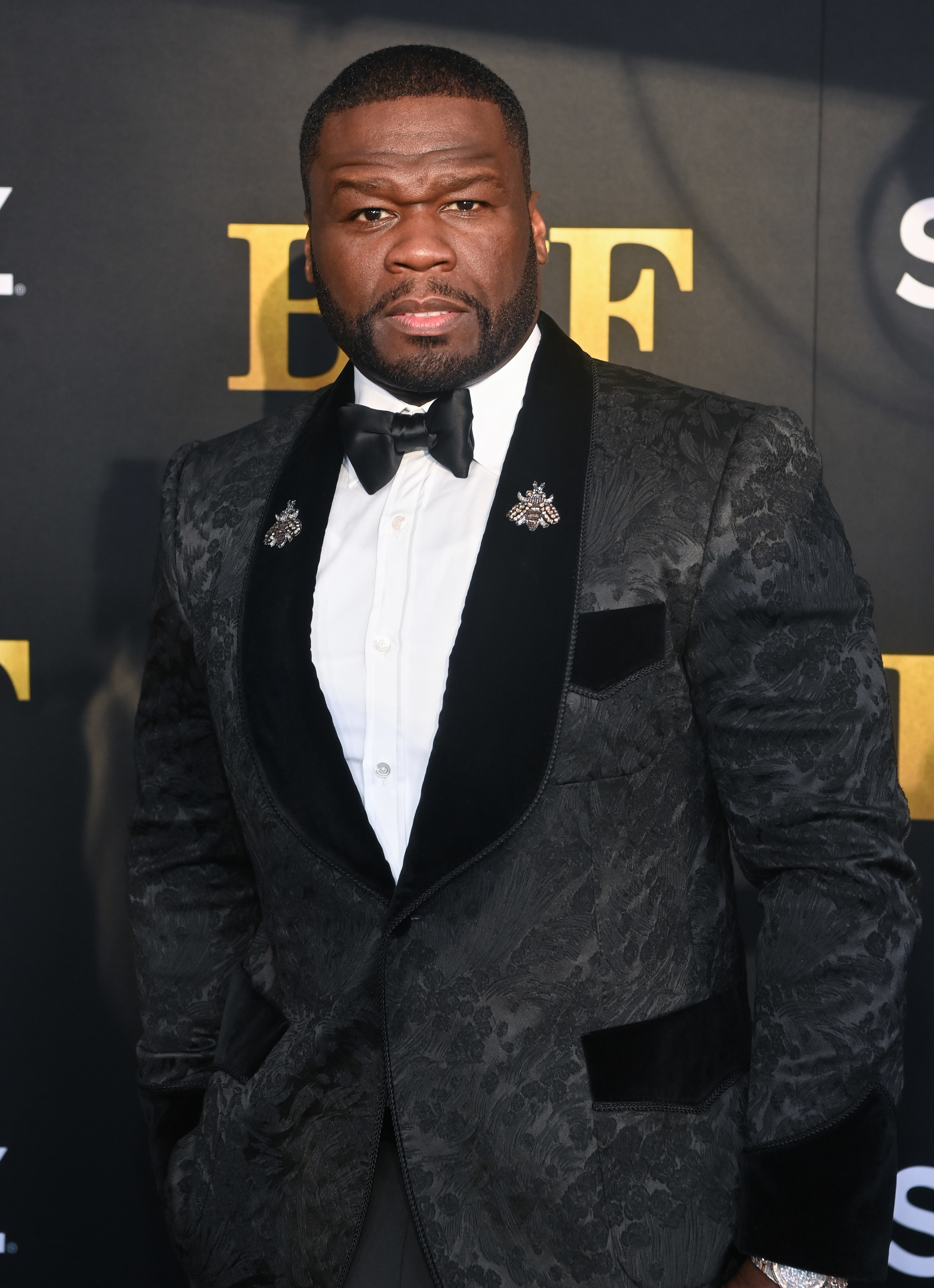 50 Cent in a tux at an event