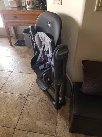 Reviewer's photo of the high chair folded up