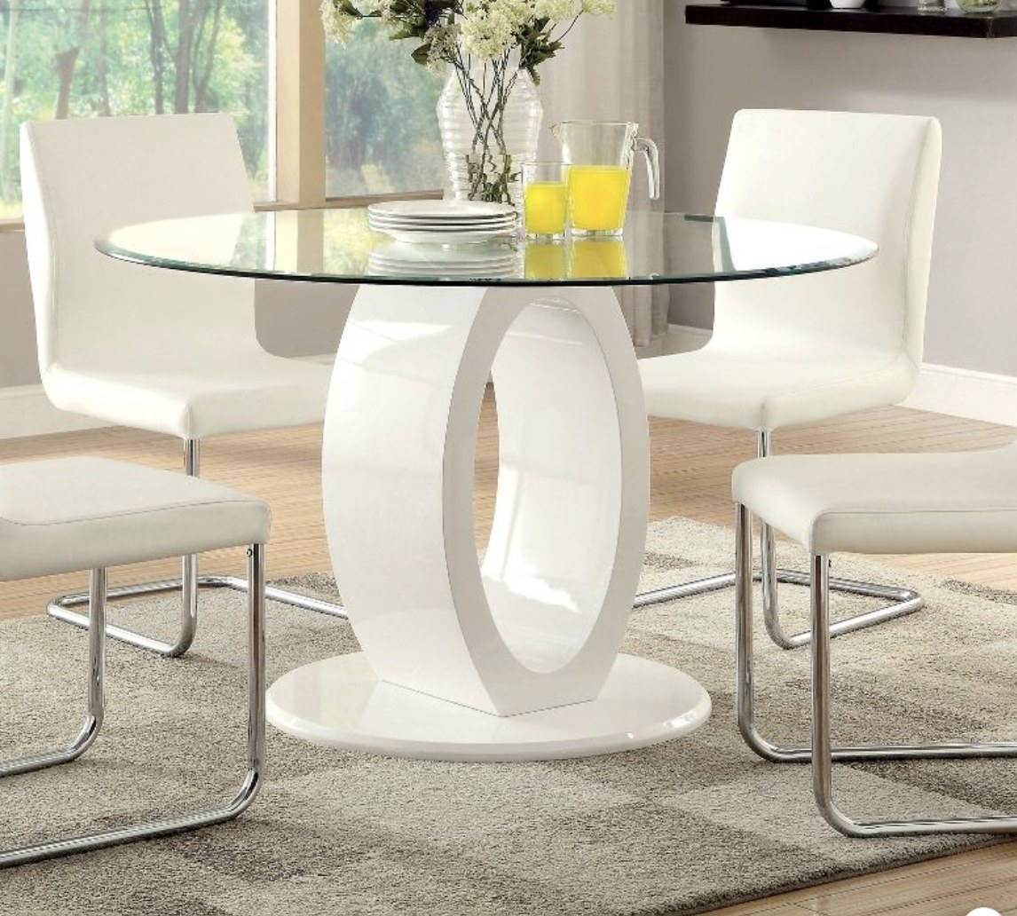 A glass table with a white dual o-shape base design.