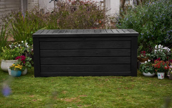 A large rectangular wooden outdoor storage with open top lid.