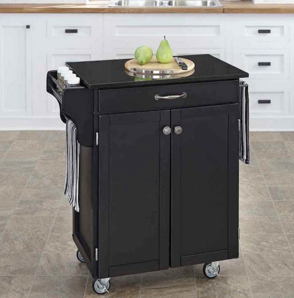 A black wooden kitchen cart.