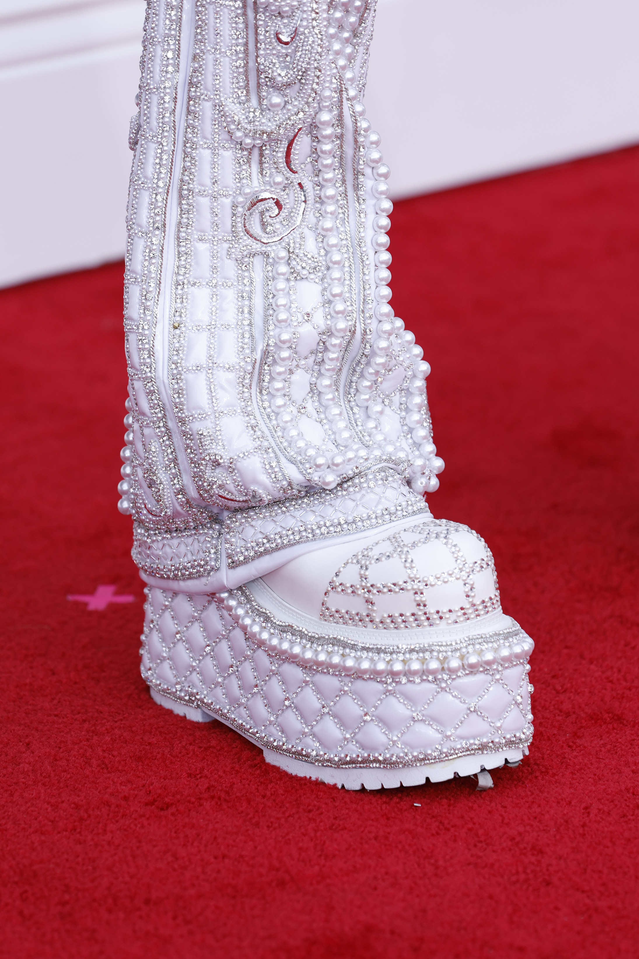 A closeup of Lil Nas X&#x27; outfit at the 2022 Grammys.